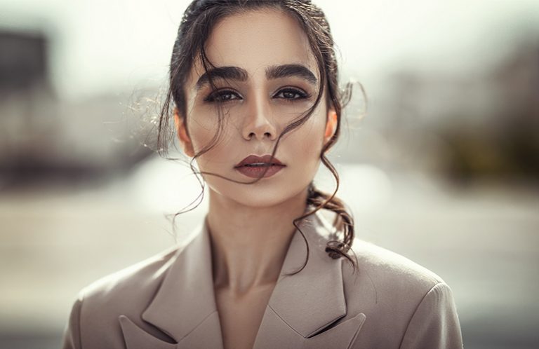 under this pile of coats